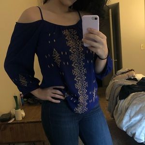 Francesca’s cold shoulder tunic top